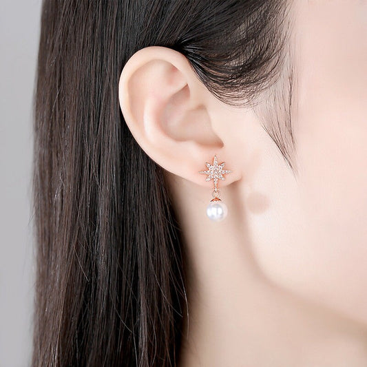 Dangle starburst earrings| north star stud earrings| earrings with pearl drops